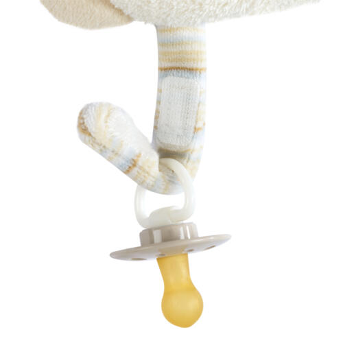 Detailaufnahme des Schnullerhalters mit Klettverschluss.