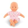 Mini Calin sitzend, die braunen Augen sind gut erkennbar
