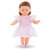 Eine Puppe trägt das rosa Glitzerkleid von Corolle.