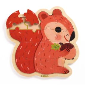 Auf dem Bild ist das Holzpuzzle Eichhörnchen zu sehen, das fast fertig zusammengesetzt ist.