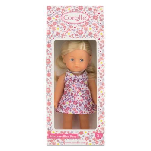 Die Verpackung der Puppe Rosy hat ein Blumenmuster und ein großes Sichtfenster.