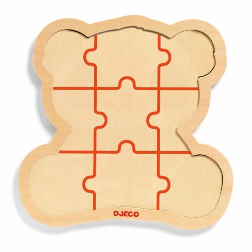 Auf dem Holzrahmen sind die Umrisse der Puzzleteile als Hilfe aufgedruckt.