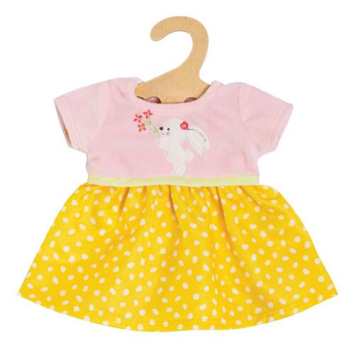 Das hübsche Heless Puppenkleid ist in angenehmen Farben gestaltet und mit einer Applikation verziert.