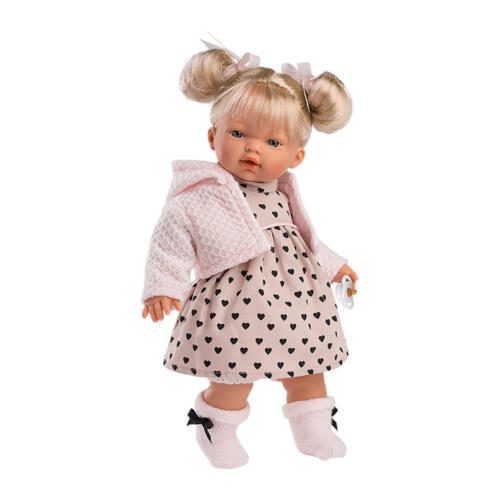 Die blonden Haare der Babypuppe sind mit Schleifen zu Zöpfen gebunden und können frisiert werden.