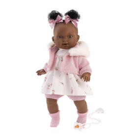 Die Babypuppe Diara trägt ein süßes Puppenoutfit und hat ihren Schnuller an einer Schnullerkette immer dabei.
