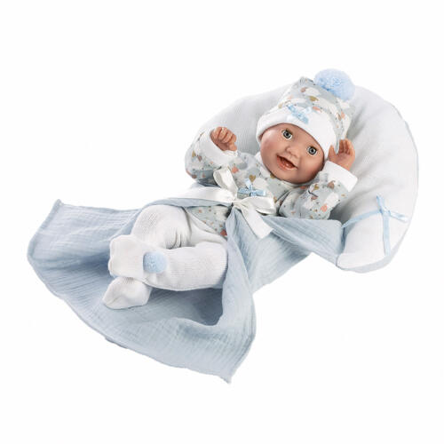 Die Babypuppe Bimbo mit ihrer Kuscheldecke. Das Gesicht ist mit einem frohen Babylachen gestaltet, das sofort die Herzen der Puppenmamas erschließt.